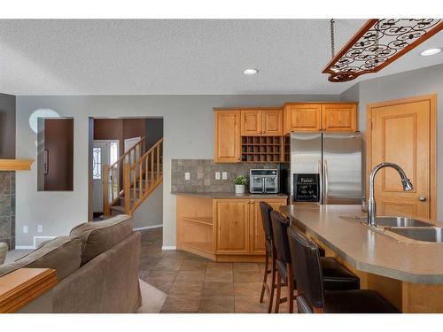 230 New Brighton Circle Se, Calgary, AB - Indoor Photo Showing Kitchen With Double Sink