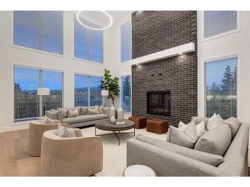 25 Timberline Court Sw, Calgary, AB - Indoor Photo Showing Living Room With Fireplace