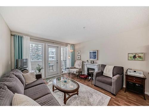 2214-928 Arbour Lake Road, Calgary, AB - Indoor Photo Showing Living Room