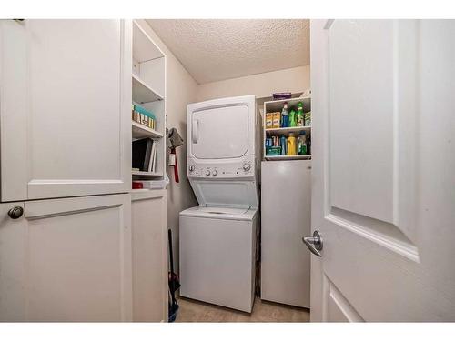 2214-928 Arbour Lake Road, Calgary, AB - Indoor Photo Showing Laundry Room