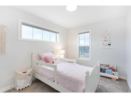 108 Magnolia Way Se, Calgary, AB - Indoor Photo Showing Bedroom