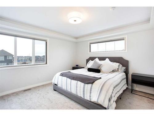 108 Magnolia Way Se, Calgary, AB - Indoor Photo Showing Bedroom