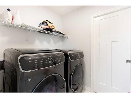 108 Magnolia Way Se, Calgary, AB - Indoor Photo Showing Laundry Room