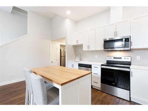 108 Magnolia Way Se, Calgary, AB - Indoor Photo Showing Kitchen