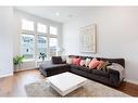 108 Magnolia Way Se, Calgary, AB  - Indoor Photo Showing Living Room 