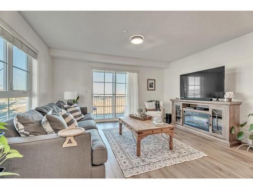 2207-279 Copperpond Common Se, Calgary, AB - Indoor Photo Showing Living Room