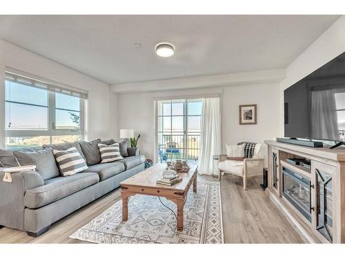 2207-279 Copperpond Common Se, Calgary, AB - Indoor Photo Showing Living Room