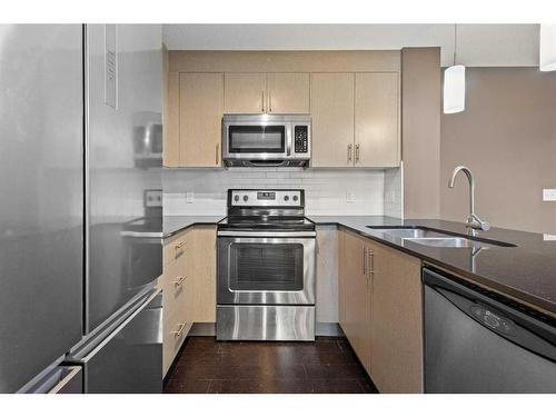 2117-240 Skyview Ranch Road Ne, Calgary, AB - Indoor Photo Showing Kitchen With Stainless Steel Kitchen With Double Sink With Upgraded Kitchen