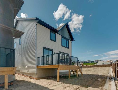 209 Creekstone Hill Sw, Calgary, AB - Outdoor With Deck Patio Veranda With Exterior