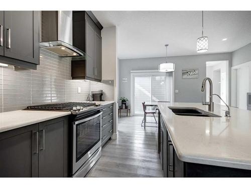 198 Yorkville Green Sw, Calgary, AB - Indoor Photo Showing Kitchen With Double Sink With Upgraded Kitchen