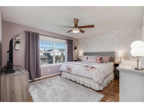 275 Sagewood Gardens Sw, Airdrie, AB - Indoor Photo Showing Bedroom