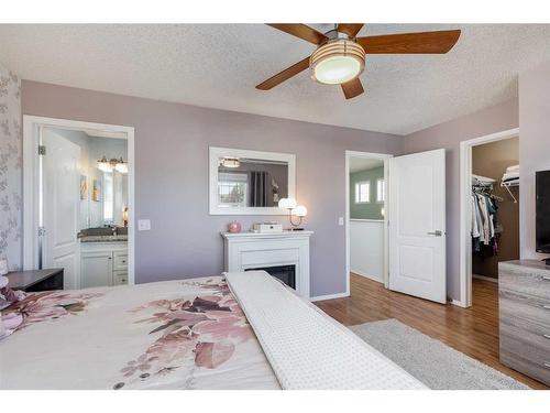 275 Sagewood Gardens Sw, Airdrie, AB - Indoor Photo Showing Bedroom