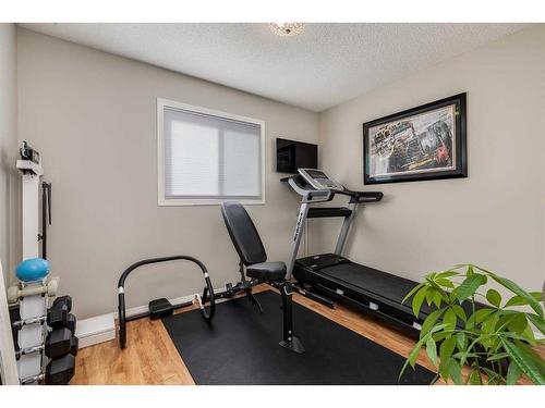 275 Sagewood Gardens Sw, Airdrie, AB - Indoor Photo Showing Gym Room