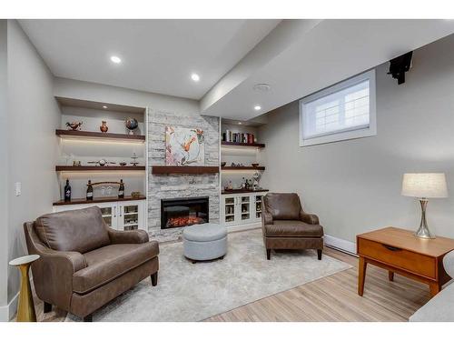 275 Sagewood Gardens Sw, Airdrie, AB - Indoor Photo Showing Basement With Fireplace