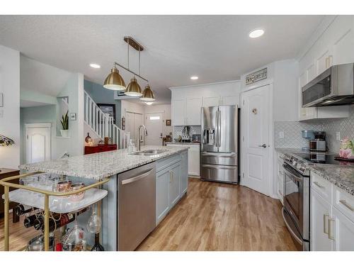 275 Sagewood Gardens Sw, Airdrie, AB - Indoor Photo Showing Kitchen With Stainless Steel Kitchen With Upgraded Kitchen