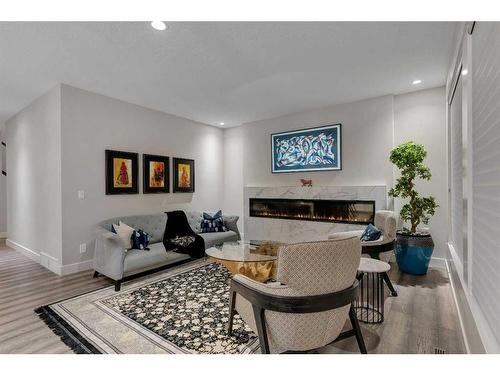 11 Mahogany Cape Se, Calgary, AB - Indoor Photo Showing Living Room With Fireplace