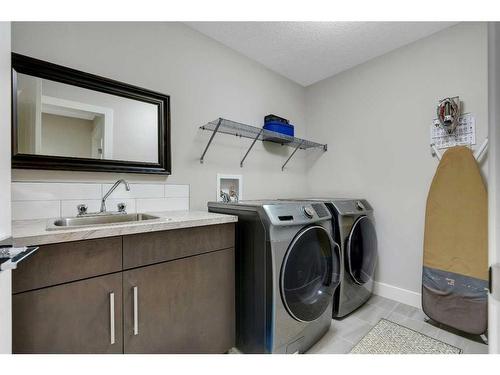 11 Mahogany Cape Se, Calgary, AB - Indoor Photo Showing Laundry Room