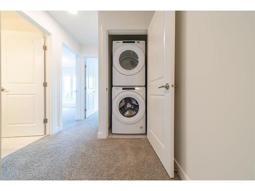 416 Sovereign Common Sw, Calgary, AB - Indoor Photo Showing Laundry Room