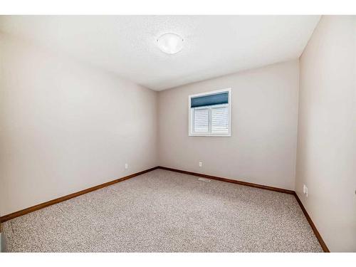 244 Chapalina Terrace Se, Calgary, AB - Indoor Photo Showing Other Room