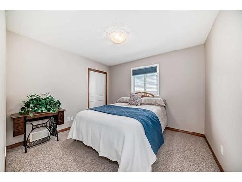 244 Chapalina Terrace Se, Calgary, AB - Indoor Photo Showing Bedroom