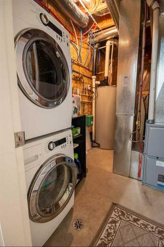 37 Bluebird Drive Se, Didsbury, AB - Indoor Photo Showing Laundry Room