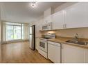 310-10 Brentwood Common Nw, Calgary, AB  - Indoor Photo Showing Kitchen 