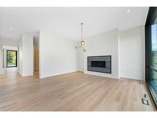 3C Willow Crescent Sw, Calgary, AB - Indoor Photo Showing Living Room With Fireplace