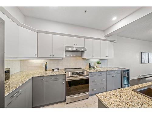 2307-10221 Tuscany Boulevard Nw, Calgary, AB - Indoor Photo Showing Kitchen With Upgraded Kitchen