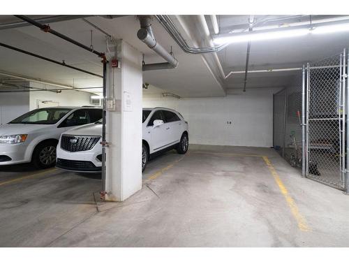 2307-10221 Tuscany Boulevard Nw, Calgary, AB - Indoor Photo Showing Garage