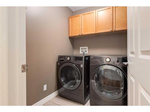 94 Discovery Ridge Gardens Sw, Calgary, AB - Indoor Photo Showing Laundry Room