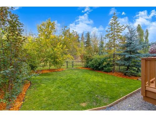 94 Discovery Ridge Gardens Sw, Calgary, AB - Outdoor With Backyard