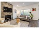 94 Discovery Ridge Gardens Sw, Calgary, AB  - Indoor Photo Showing Living Room With Fireplace 