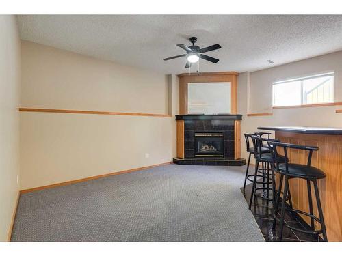 12 Big Springs Rise Se, Airdrie, AB - Indoor With Fireplace