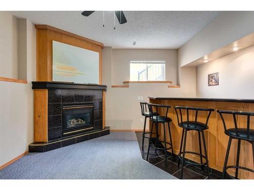 12 Big Springs Rise Se, Airdrie, AB - Indoor With Fireplace