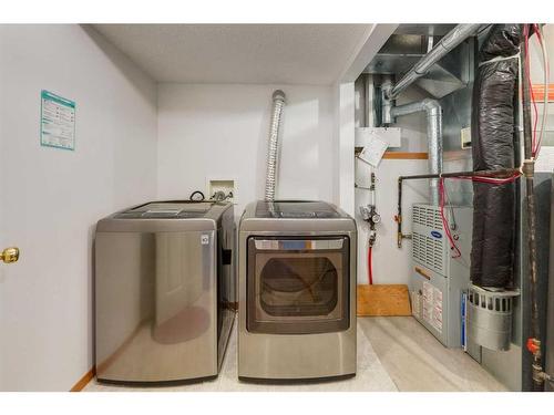 12 Big Springs Rise Se, Airdrie, AB - Indoor Photo Showing Laundry Room