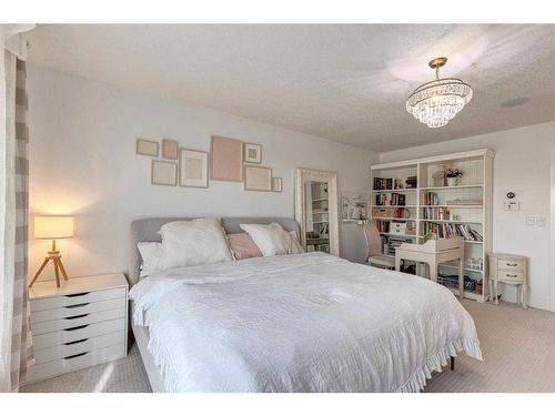 41 Strathlea Court Sw, Calgary, AB - Indoor Photo Showing Bedroom