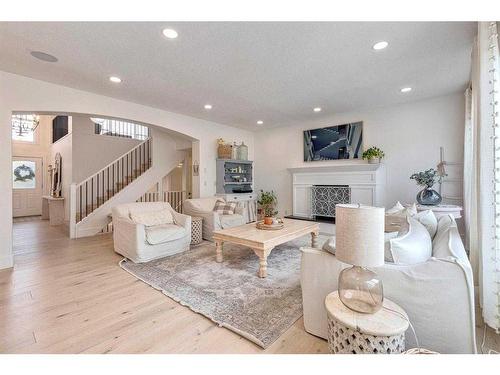 41 Strathlea Court Sw, Calgary, AB - Indoor Photo Showing Living Room With Fireplace