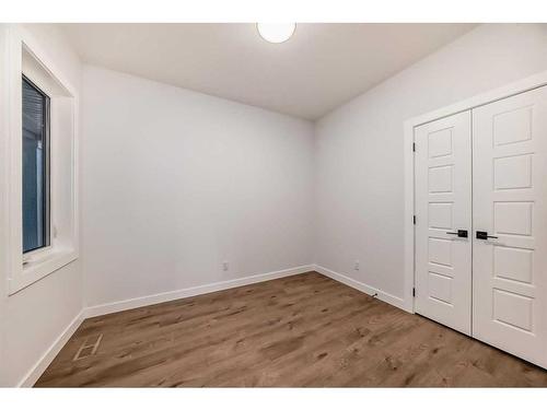 166 Amblehurst Way Nw, Calgary, AB - Indoor Photo Showing Other Room