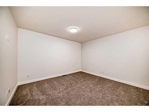 166 Amblehurst Way Nw, Calgary, AB - Indoor Photo Showing Other Room