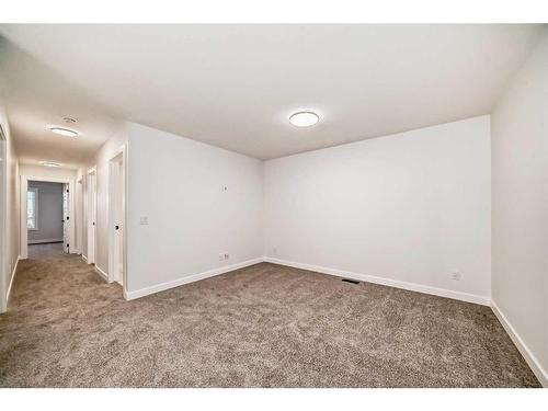 166 Amblehurst Way Nw, Calgary, AB - Indoor Photo Showing Other Room