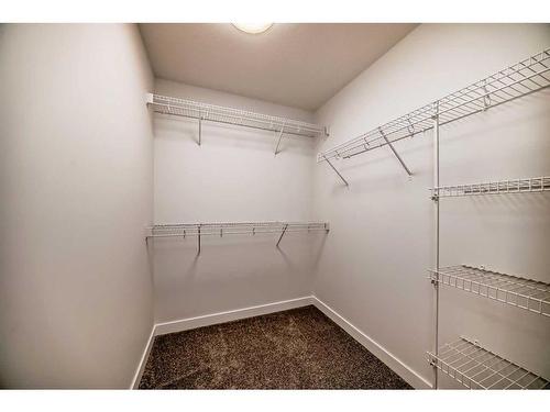 166 Amblehurst Way Nw, Calgary, AB - Indoor With Storage