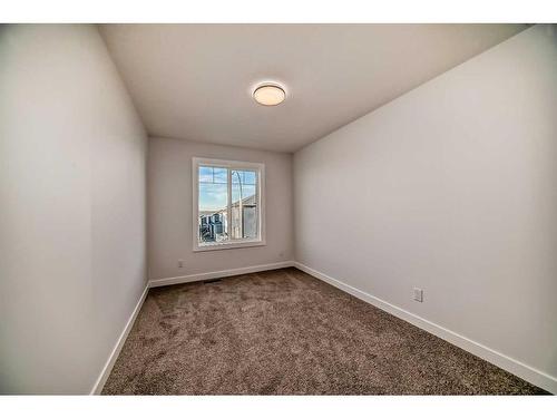 166 Amblehurst Way Nw, Calgary, AB - Indoor Photo Showing Other Room