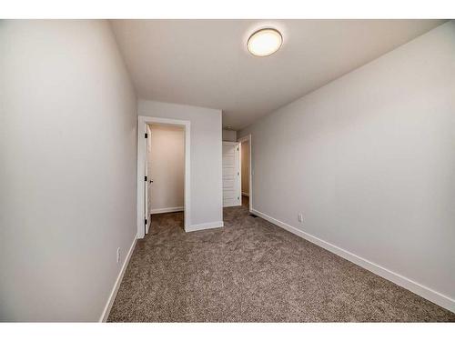 166 Amblehurst Way Nw, Calgary, AB - Indoor Photo Showing Other Room