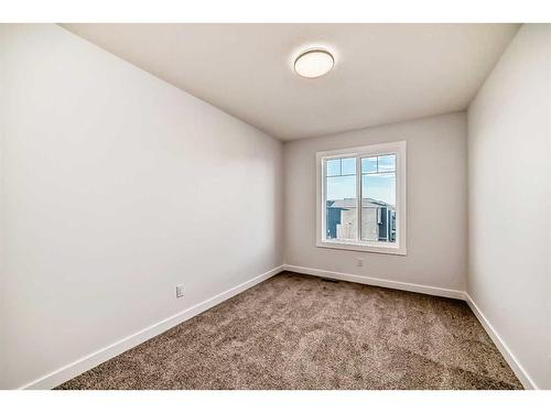 166 Amblehurst Way Nw, Calgary, AB - Indoor Photo Showing Other Room