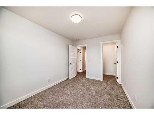 166 Amblehurst Way Nw, Calgary, AB - Indoor Photo Showing Other Room