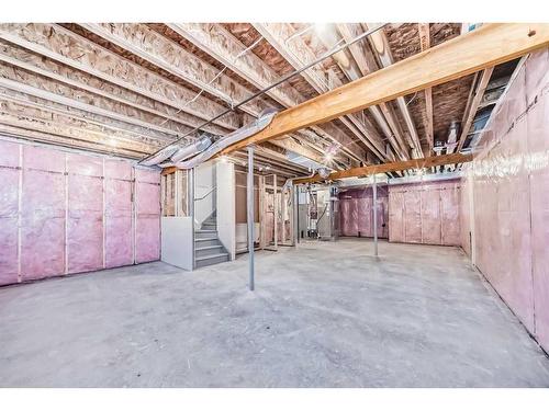 166 Amblehurst Way Nw, Calgary, AB - Indoor Photo Showing Basement