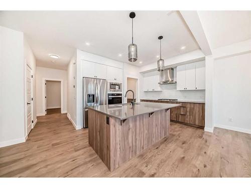 166 Amblehurst Way Nw, Calgary, AB - Indoor Photo Showing Kitchen With Upgraded Kitchen