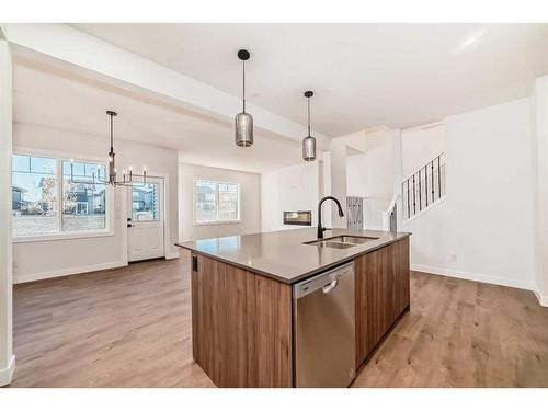 166 Amblehurst Way Nw, Calgary, AB - Indoor Photo Showing Kitchen With Double Sink