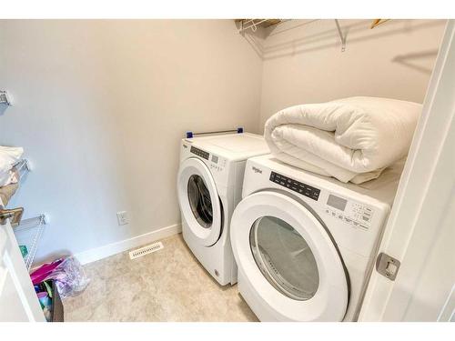 748 Seton Circle Se, Calgary, AB - Indoor Photo Showing Laundry Room