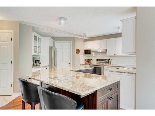 28 Simcrest Point Sw, Calgary, AB - Indoor Photo Showing Kitchen With Upgraded Kitchen